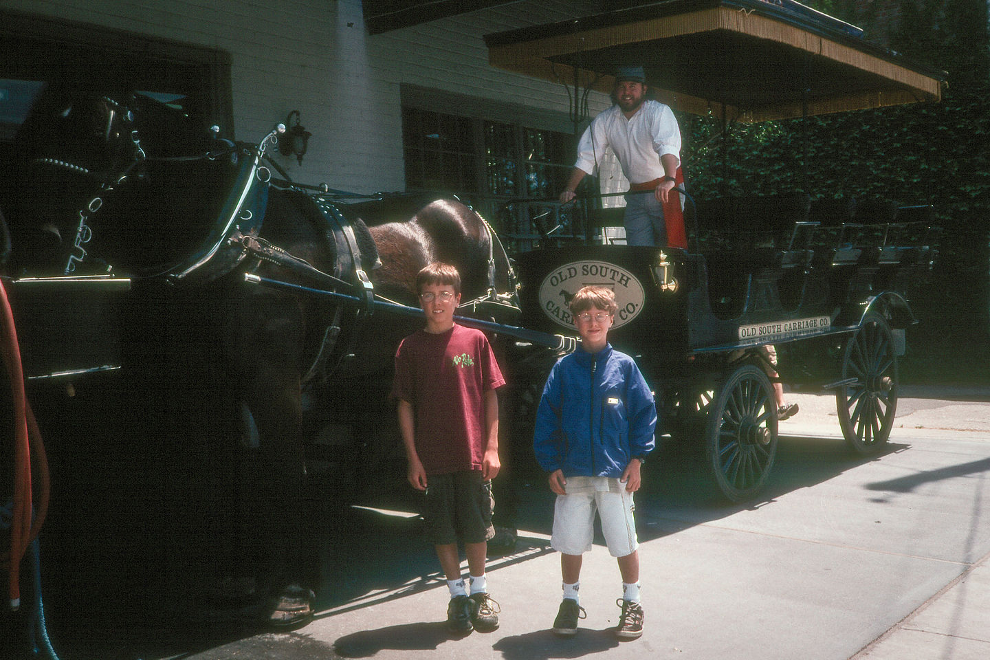 Boys with horse-drawn carriage