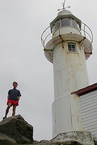 Herb with Lobster Cove Lighthouse