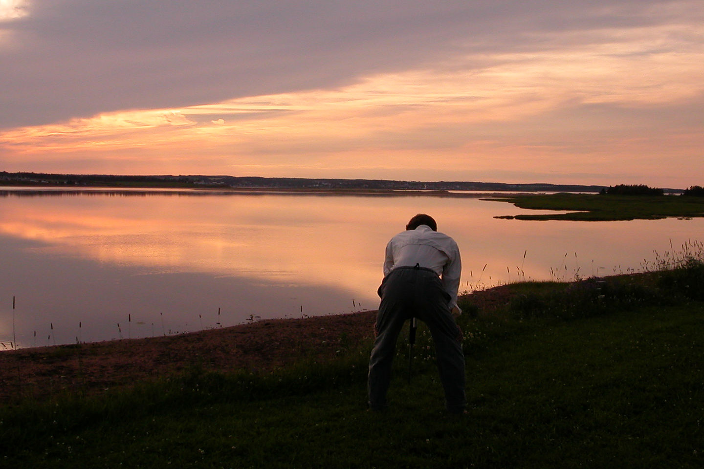 Herb photographing sunset from campsite