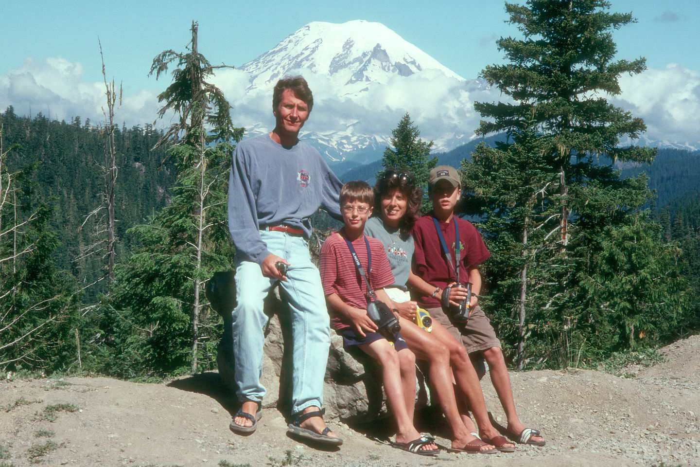 Family in front of the elusive Mt. Rainier