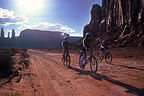 Lolo and the boys biking through Monument Valley