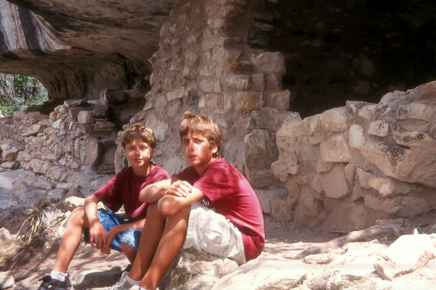 Boys in ancient cliff dwelling