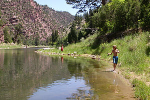 Boys stalking the Green River for trout