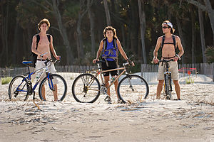 Lolo &amp; Boys getting ready to bike on beach
