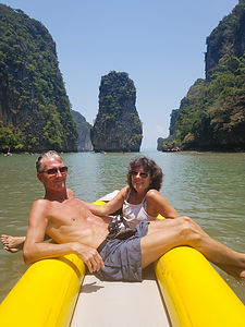 Enjoying being kayaked around beautiful Phang Nga Bay