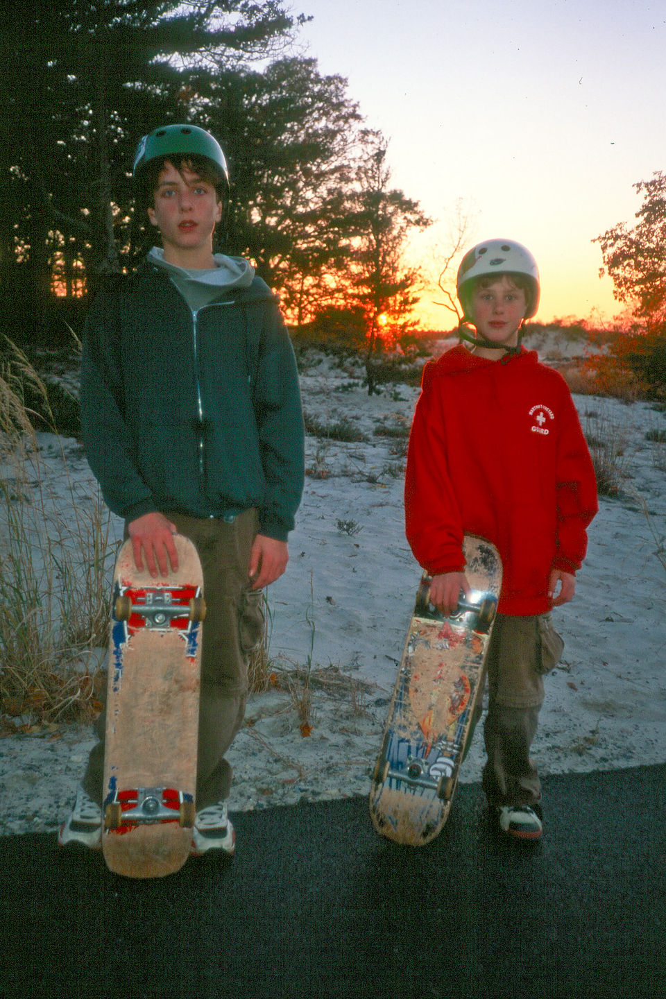 Boys post skate boarding