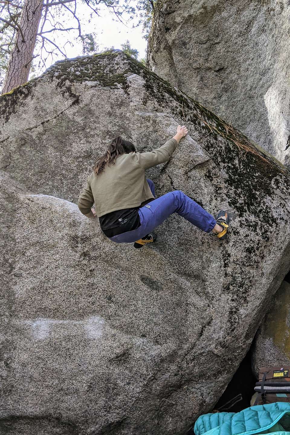Erin bouldering without a wedding dress